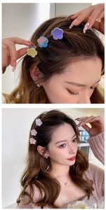Gros plan de mini pinces à cheveux en acétate en forme de fleur au style sucré