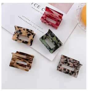 Five-piece set of square acetate hair claws in assorted marble and leopard patterns