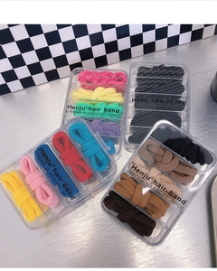 Set di 25 elastici per capelli spessi in peluche in scatole trasparenti colorate