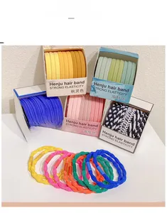 Detail of high elasticity colorful hair bands in assorted shades and spiral textures
