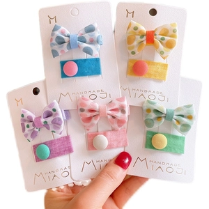 Floral polka dot bow hair clip set for kids with colorful fabric snap barrettes