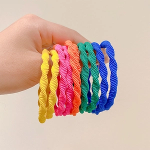Set of ten colorful spiral hair ties for women and kids in bright candy colors
