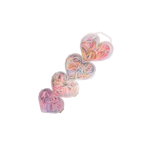 Lot d'élastiques à cheveux colorés pour filles dans quatre boîtes de rangement en cœur