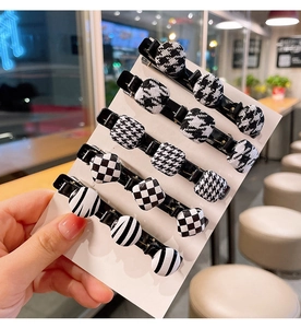 Lot de cinq barrettes à cheveux noir et blanc avec motifs à carreaux et pied-de-poule