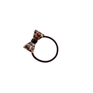 Élastique à cheveux avec un nœud papillon en résine aux motifs léopard marron et noir