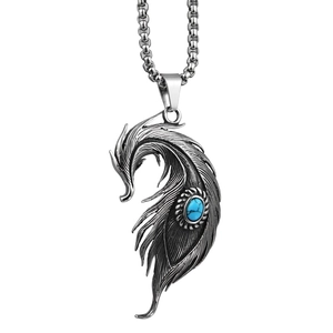 Collier vintage en acier titane avec pendentif plume courbée et pierre turquoise bleue