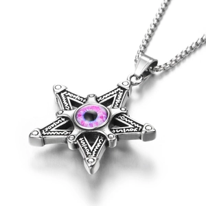 Macro detail of gothic hexagram pendant with a purple eyeball inlay and vintage finish