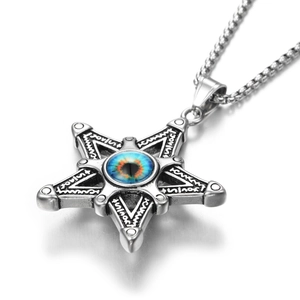 Detail of star-shaped pendant with evil eye center and hexagram geometric engravings
