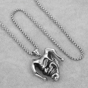 Detailed view of evil jester pendant in silver finish on a classic box chain necklace