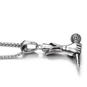Hip hop style stainless steel necklace featuring a hand holding microphone pendant
