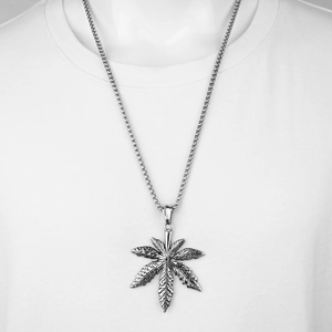 Minimalist hip hop stainless steel necklace featuring a large maple leaf pendant on a box chain