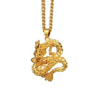 Classic golden Chinese dragon pendant necklace with intricate scales and twist curb chain