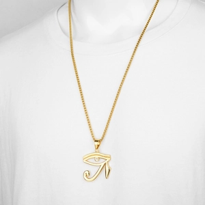 Hip hop Eye of Horus necklace in gold finish with white zircon on male model