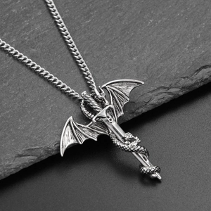 Detail of gothic dragon wing sword pendant with snake wrap in vintage silver finish