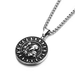 Detail of vintage religious relief pendant necklace with box chain in silver titanium steel