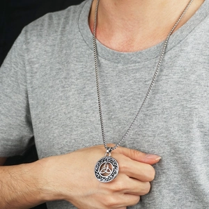 Men's Celtic knot pendant necklace in silver stainless steel with a round triquetra design
