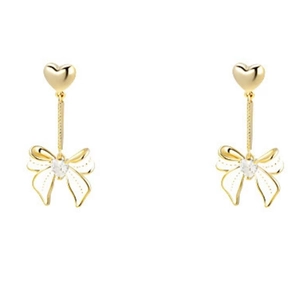 Élégantes boucles d'oreilles cœur doré avec nœud papillon blanc et pendentif cœur cristal