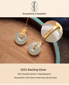 Détail du poinçon S925 sur ces boucles d'oreilles longues de style chinois