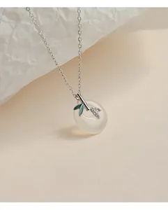 Detailed close-up of 925 sterling silver necklace featuring jade pendant with bamboo design