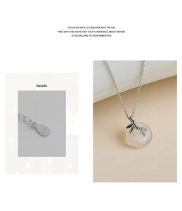 Detailed macro view of S925 silver bamboo leaf pendant with white chalcedony stone