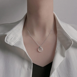 925 silver necklace with white jade pendant and green bamboo leaf on model