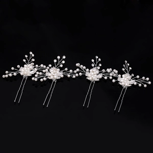 Elegant 4-piece bridal hair pin set with white pearls and rhinestones on silver finish