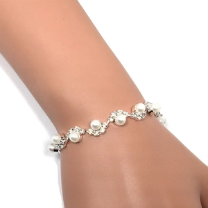 Elegante bracciale da sposa con perle rotonde e strass scintillanti su catena d'argento