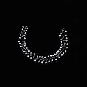 Handmade bridal headpiece with white pearls and sparkling rhinestones on silver wire