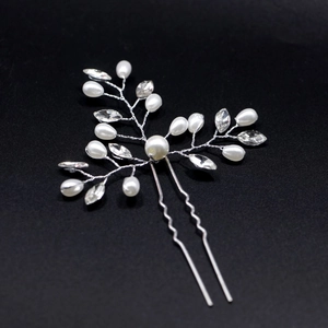 Elegant silver U-shaped bridal hair pin with pearls and crystals in a branch design