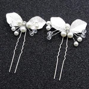 Lot de deux épingles à cheveux baroques en feuilles d'argent avec perles et cristaux