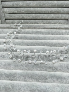 Detail showing handcrafted silver bridal hair vine with pearls and clear crystal beads