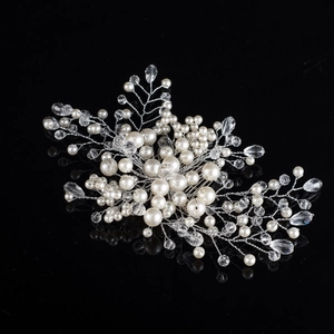 Handmade bridal hair comb featuring white pearls and clear crystal beads on a silver wire
