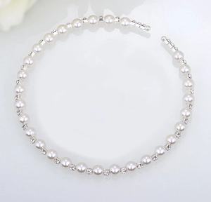 Detailed close-up of handmade bridal choker featuring 8mm pearls and sparkling rhinestones