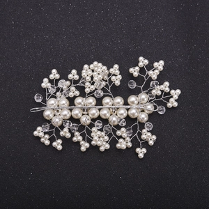 Elegant silver handmade bridal hair comb with white pearls and sparkling crystals