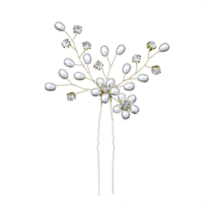 Detailed view of handmade bridal hair pin with pearls and crystals on gold wire