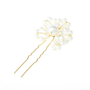 Detail of bridal hair pin with large white pearl, crystal beads and gold wire U-shaped fork