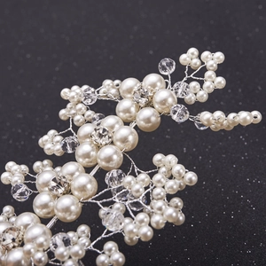Handmade bridal hair comb with white pearls and crystals on silver wire for weddings