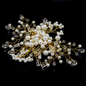 Handmade bridal hair comb with elegant white pearls and crystals on gold wire floral design