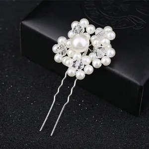 Handmade bridal U-shaped hair pin with white pearls and clear crystals on black background