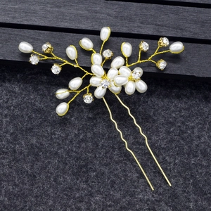 Detail of bridal hair pin with pearls and crystals on gold wire floral design