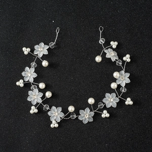 Handmade bridal hair vine with frosted flowers and white pearls on a silver wire