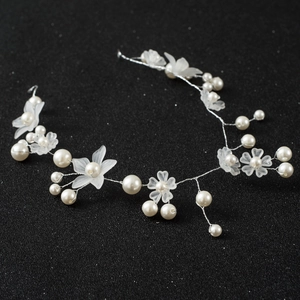 Handmade bridal hair vine with white frosted flowers and pearls on silver wire