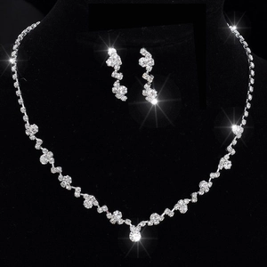 Luxurious silver-tone crystal necklace and drop earrings set for brides and weddings