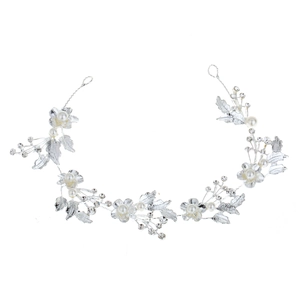 Silver bridal hair vine with sparkling crystals, white pearls, and leaf-shaped floral design