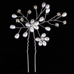 Handmade bridal hair pin with white pearls and crystal flower on silver U-shaped clip