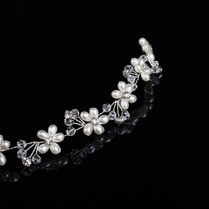 Silver bridal headband with handmade pearl flowers and sparkling rhinestone accents