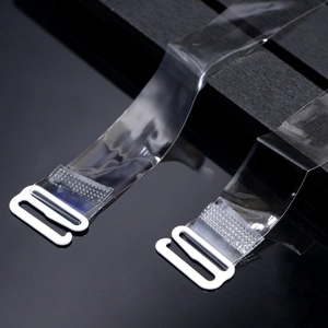 Vista macro delle spalline del reggiseno in TPU con ganci bianchi e trama antiscivolo