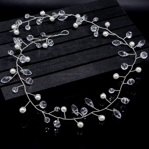 Elegant bridal hair vine with white pearls and crystals on flexible silver wire