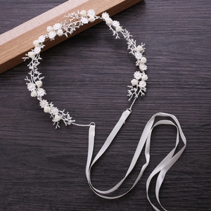 Elegant white rhinestone flower bridal headband with silver wire and satin ribbon