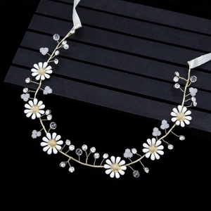 Handmade bridal headband with white daisy flowers and gold wire crystals for weddings